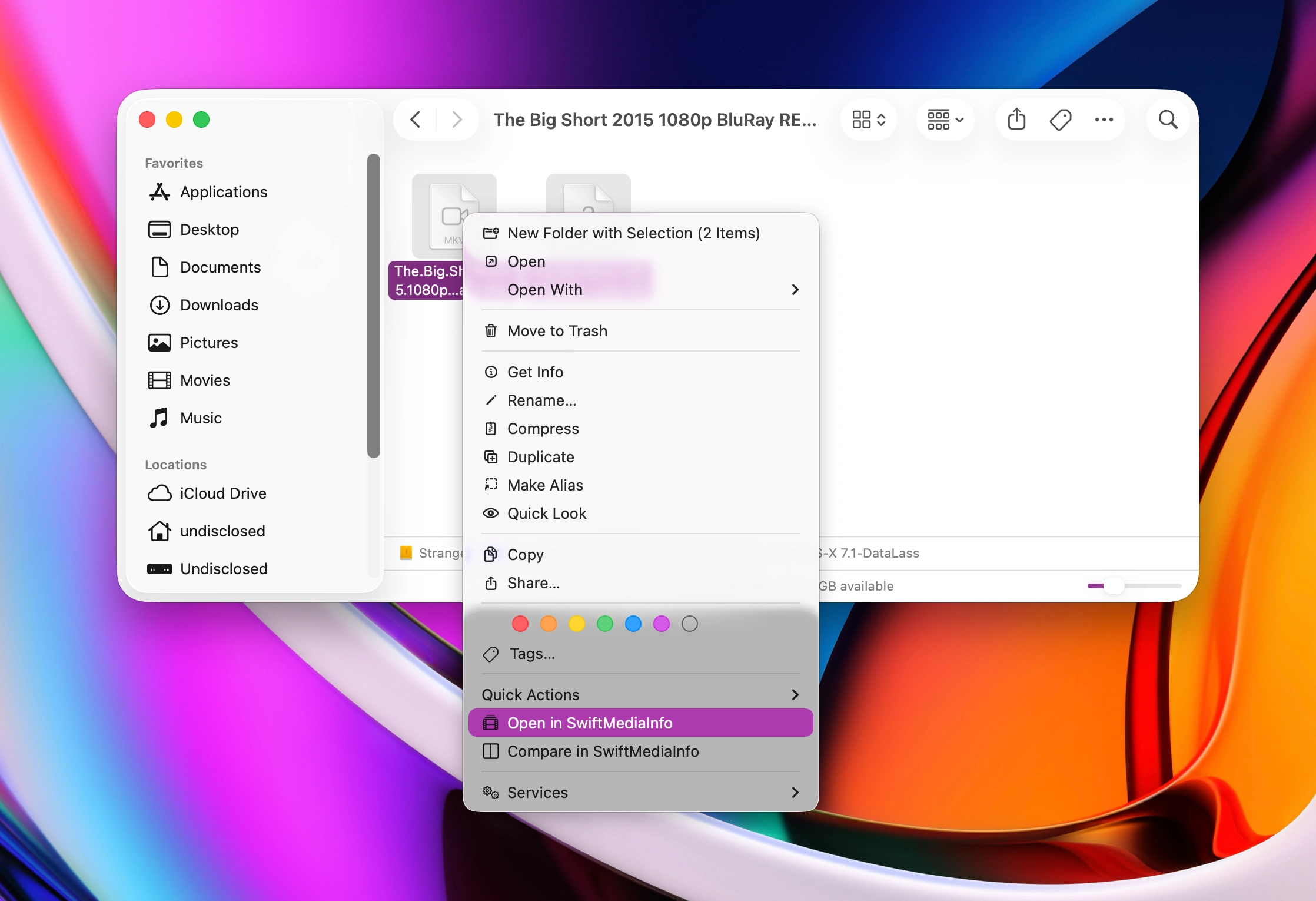 The Finder right-click menu with the SwiftMediaInfo entry.
